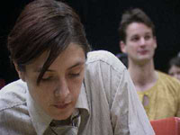Bacchae photo: actors looking pensive