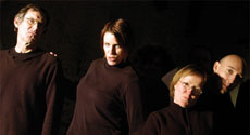 Twelfth Night photo: actors in black costumes